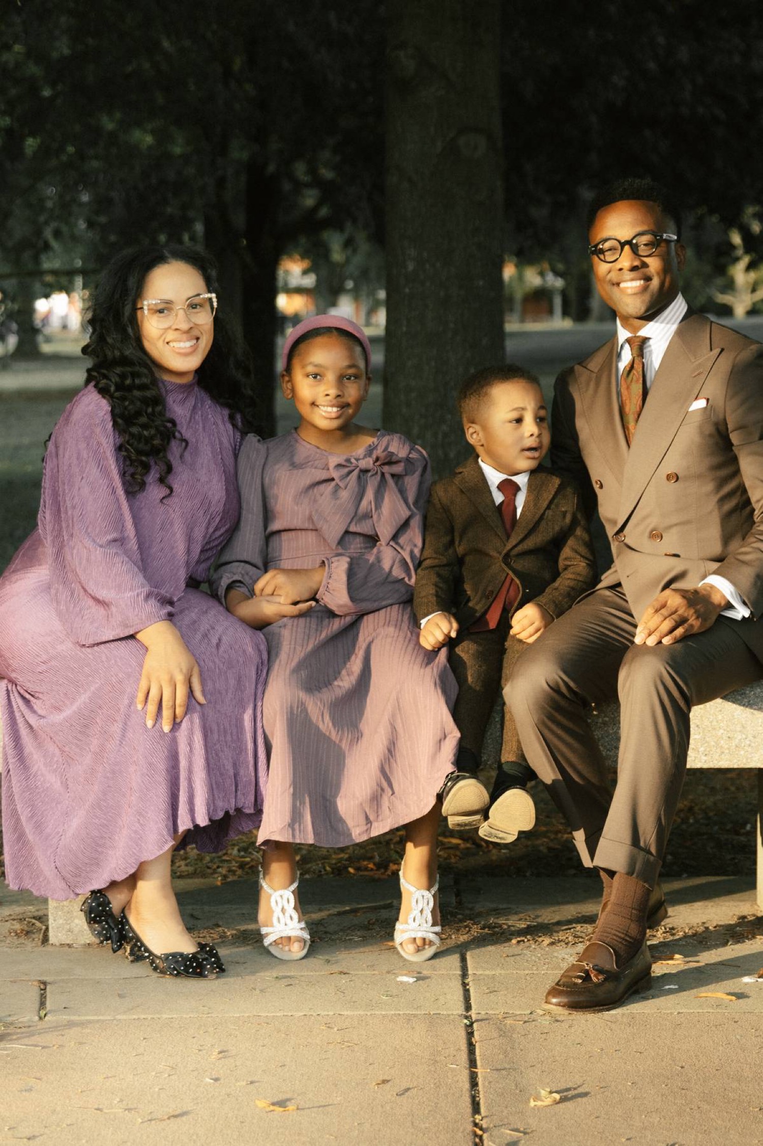 Pastor and First Lady Jones seated with Maevrie and Greyson